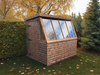 Solar Potting Shed in a natural timber finish, viewed from the right of the building