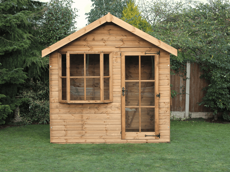 Classic wooden summerhouse with large bay window, single door. Viewed from the front. 