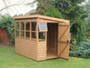 Classic wooden shed with side door, side opening windows, windows all along the front, slatted staging. Viewed from the front/right side. 