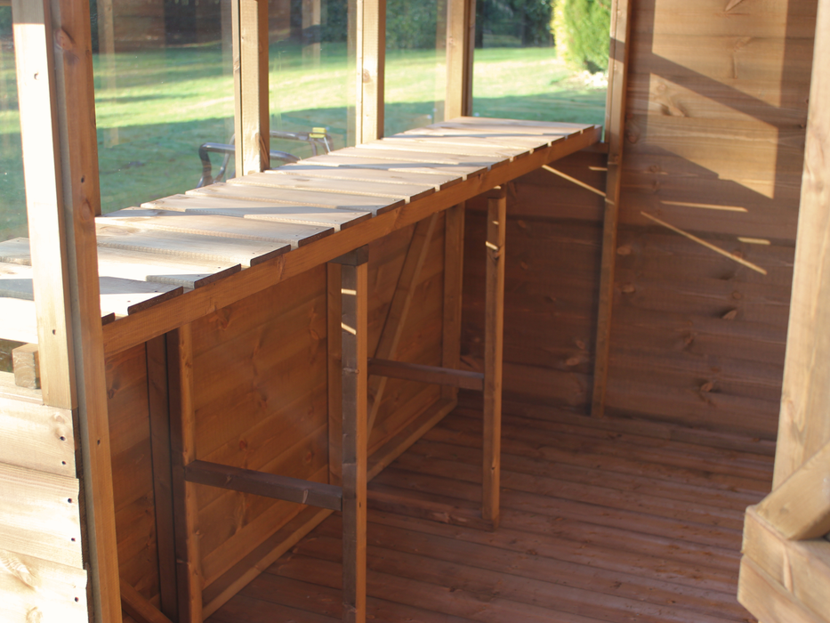 Interior of wooden shed, close up on the slatted staging. 