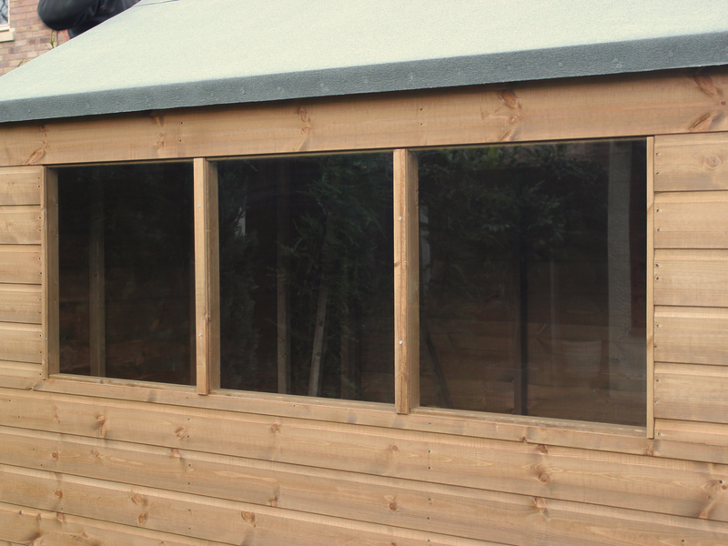 Close up of three side windows on supreme apex shed. 