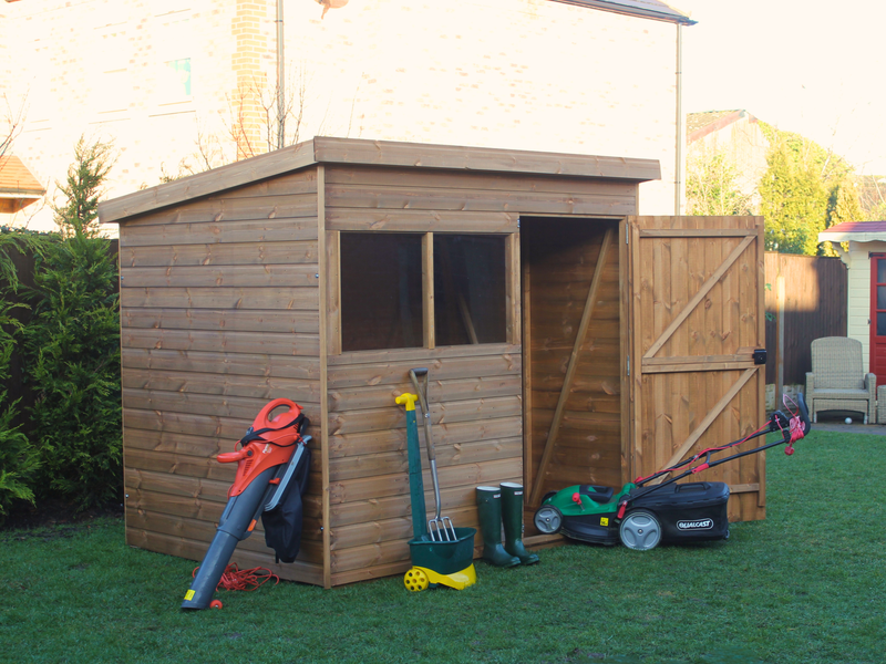 Supreme wooden pent shed with single door opened, two front windows, viewed from the front/left side. 
