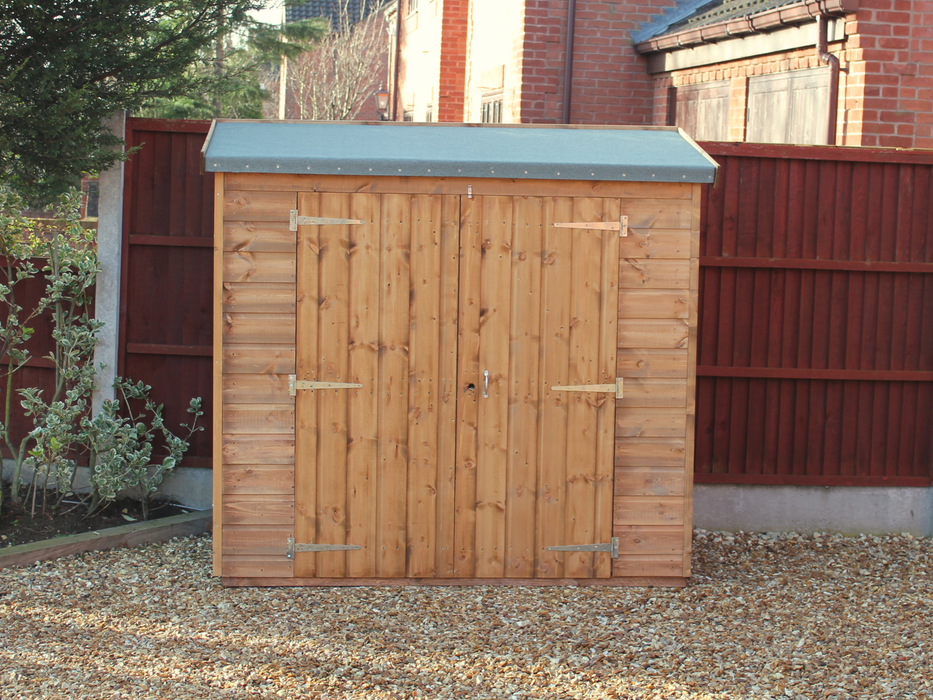 Small wooden tool shed with double doors viewed from the front. 