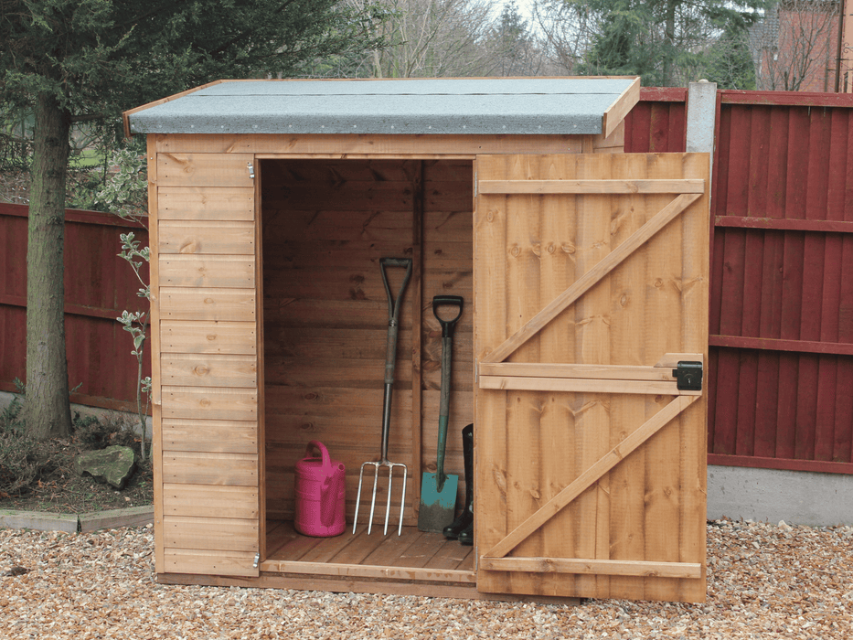 Small wooden tool shed, single door open showing interior, viewed from the front. 