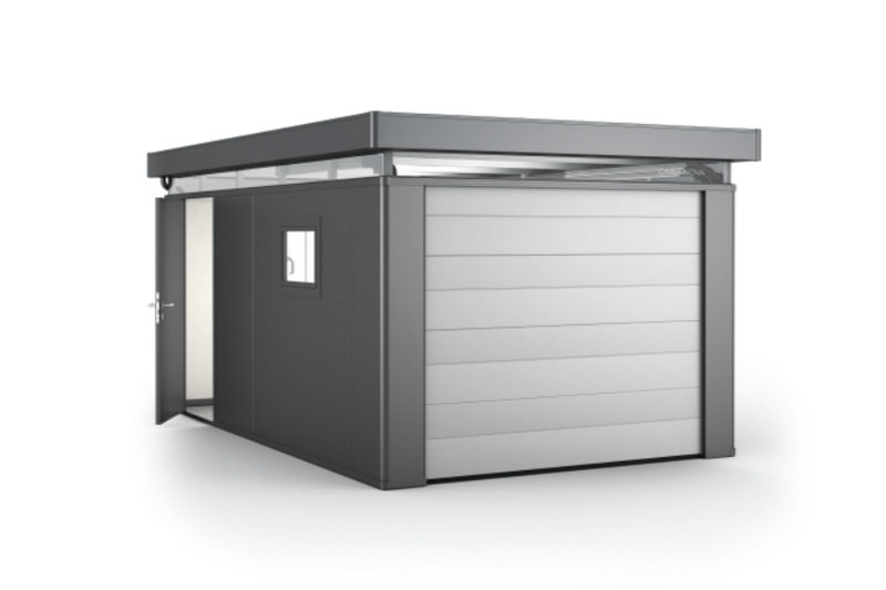 CasaNova steel building used as a garage with added garage door