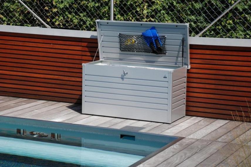 LeisureTime steel outdoor storage box by a pool, opened and showing a lid storage net in use