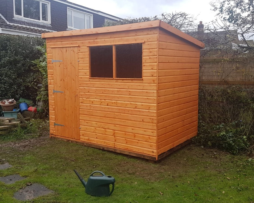 Standard Pent Shed in a garden